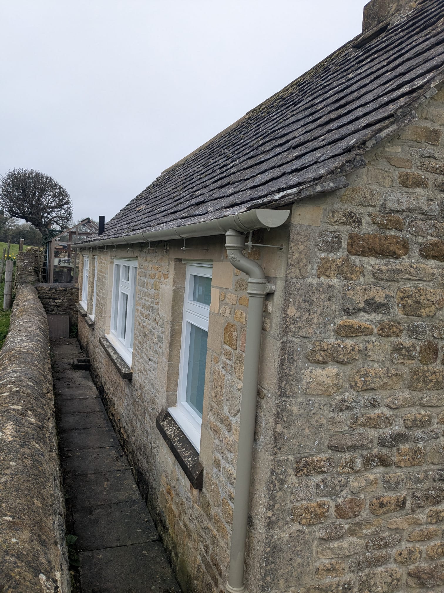 Cast iron Gutter on a costswold stone property near Burford